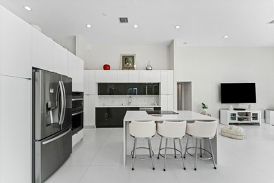 Experience modern luxury in this stunningly renovated 4-bedroom - photo 14