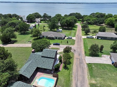 BEAUTIFULLY LANDSCAPED HOME ON 4 LOTS AT THE HEART OF THE LAKE - photo 45