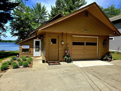 Robinson Lake Home For Sale in White Cloud Michigan