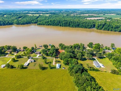 ELK RIVER WATERFRONT RETREAT! Rare 1-acre waterfront lot on the - photo 14