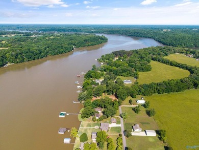 ELK RIVER WATERFRONT RETREAT! Rare 1-acre waterfront lot on the - photo 15