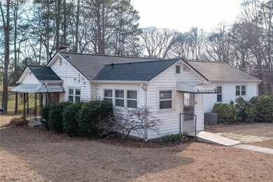 Rare find 5 acre oasis in the middle of the city! Secluded and