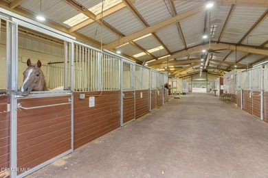 Introducing a truly remarkable 25-acre equestrian estate in the - photo 29