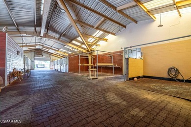 Introducing a truly remarkable 25-acre equestrian estate in the - photo 31