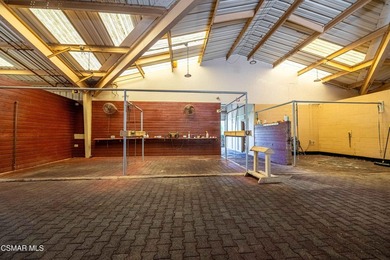 Introducing a truly remarkable 25-acre equestrian estate in the - photo 32