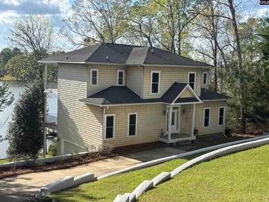 Perched on a hillside overlooking the lake and facing due West - photo 1