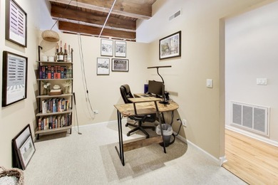 Step into this stunning brick-and-timber loft at the Premiere