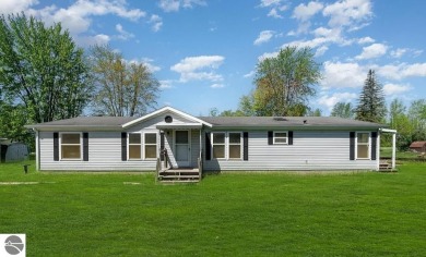 Wixom Lake Home For Sale in Beaverton Michigan