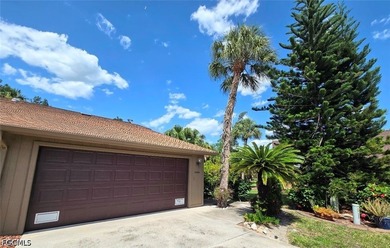 This REMODELED ATTACHED VILLA is located in the very Lushly - photo 3
