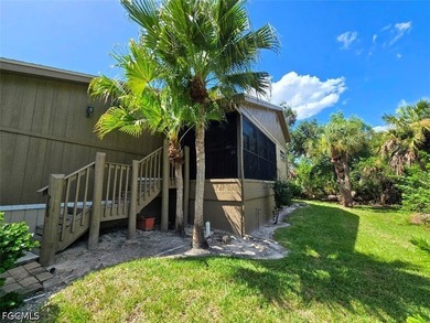 This REMODELED ATTACHED VILLA is located in the very Lushly - photo 4