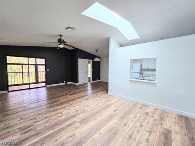 This REMODELED ATTACHED VILLA is located in the very Lushly - photo 6