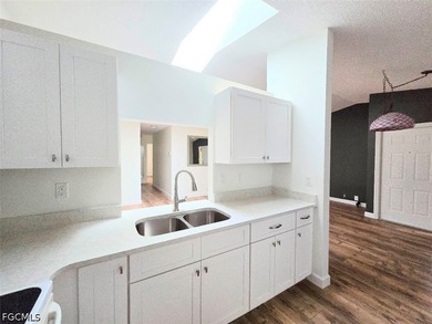 This REMODELED ATTACHED VILLA is located in the very Lushly - photo 9