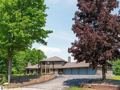 Lake Skegemog Home For Sale in Williamsburg Michigan