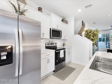 Nearly New Townhome with Backyard Oasis + Assumable 5.25% Loan! - photo 11