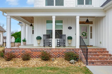 This thoughtfully designed home blends Southern charm with - photo 4