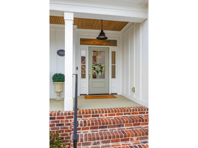 This thoughtfully designed home blends Southern charm with - photo 5