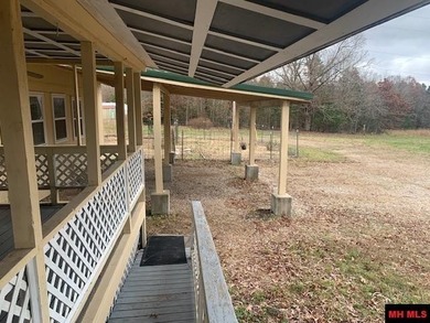 Great buy on a 2,000 sq ft home (3 bdrm/2 bath) fronting scenic