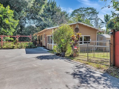 Tucked behind a rock wall on 2.13 private acres in Orchid Land - photo 1