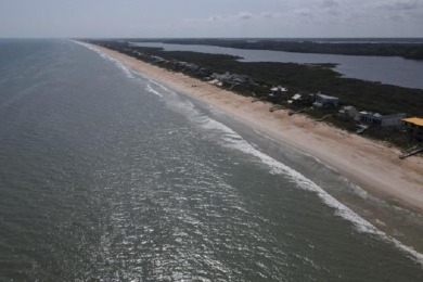 Poised atop a picturesque dune, this remarkable home offers - photo 2