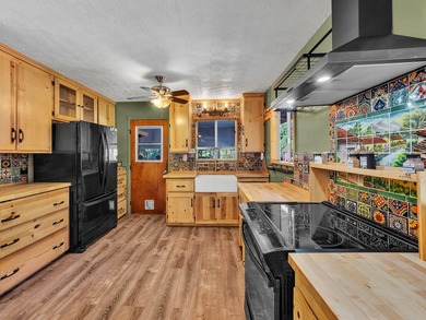 Tucked behind a rock wall on 2.13 private acres in Orchid Land - photo 5