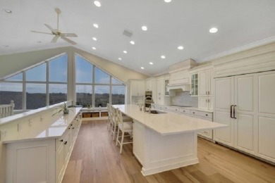 Poised atop a picturesque dune, this remarkable home offers - photo 10