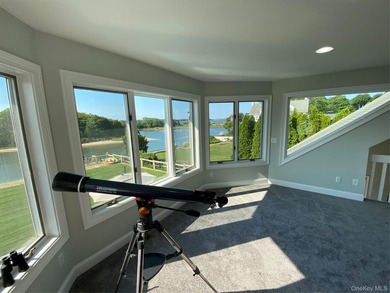 Waterfront living designed for effortless coastal comfort - photo 11