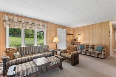 Discover the perfect lake retreat with this charming cabin on - photo 17