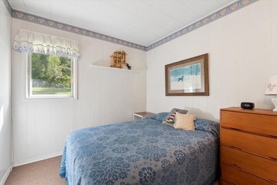 Discover the perfect lake retreat with this charming cabin on - photo 18