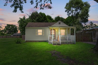 This charming Buchanan ranch has 2 bedrooms, 1 bathroom, and a - photo 1