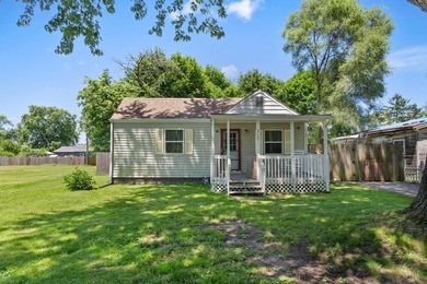 This charming Buchanan ranch has 2 bedrooms, 1 bathroom, and a - photo 2