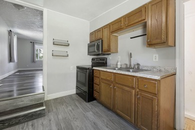 This charming Buchanan ranch has 2 bedrooms, 1 bathroom, and a - photo 3