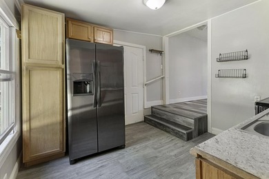 This charming Buchanan ranch has 2 bedrooms, 1 bathroom, and a - photo 4