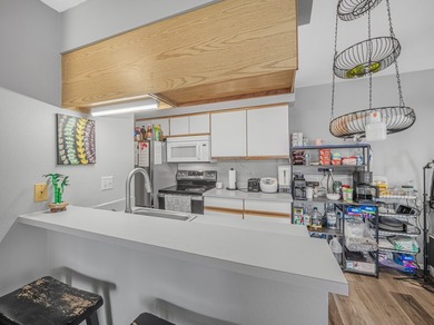 This two-bedroom, two-bath upstairs unit in Fairway Terrace - photo 4