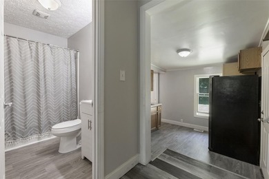 This charming Buchanan ranch has 2 bedrooms, 1 bathroom, and a - photo 10