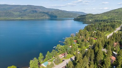 Discover the perfect lake retreat with this charming cabin on - photo 32