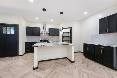 Discover modern living in this beautifully designed 4-bedroom, 2 - photo 5