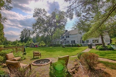 Picturesque Colonial home residing on nearly 10 acres. Located - photo 3