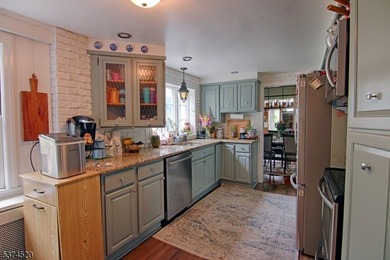 Picturesque Colonial home residing on nearly 10 acres. Located - photo 6