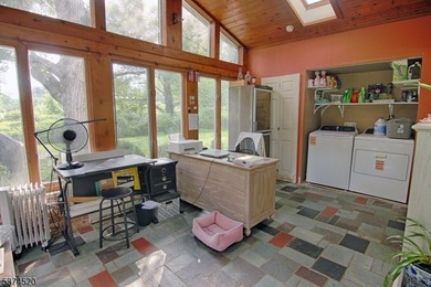Picturesque Colonial home residing on nearly 10 acres. Located - photo 10