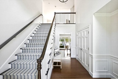 This meticulously renovated waterfront Cape on the bay is - photo 11