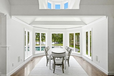 This meticulously renovated waterfront Cape on the bay is - photo 13
