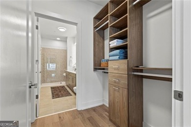 Better than new, this top-floor Midtown residence impresses with