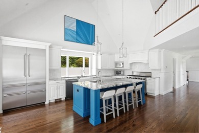 This meticulously renovated waterfront Cape on the bay is - photo 14