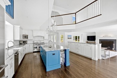 This meticulously renovated waterfront Cape on the bay is - photo 16