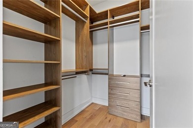 Better than new, this top-floor Midtown residence impresses with