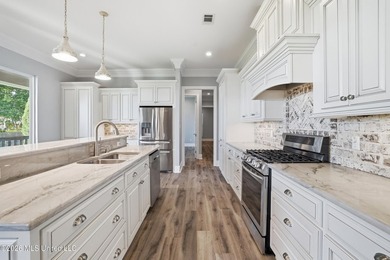 Rare waterfront opportunity in Gautier! Situated on almost 2 - photo 17