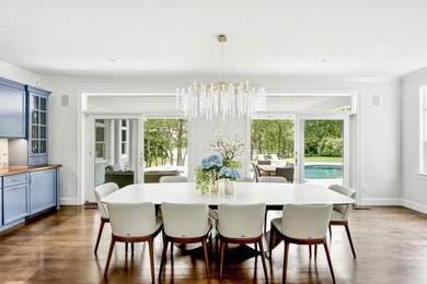 This meticulously renovated waterfront Cape on the bay is - photo 19