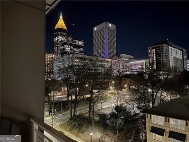 Better than new, this top-floor Midtown residence impresses with