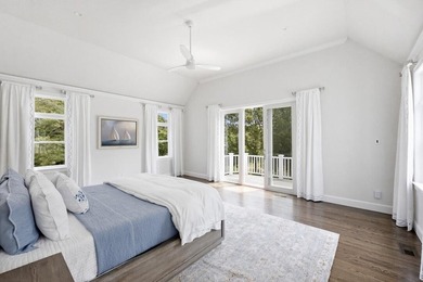 This meticulously renovated waterfront Cape on the bay is - photo 23