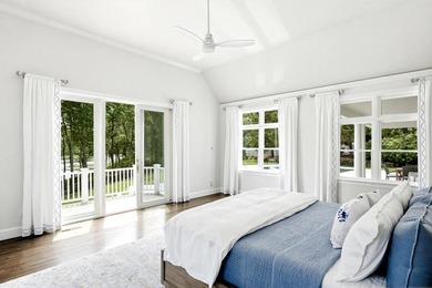 This meticulously renovated waterfront Cape on the bay is - photo 24